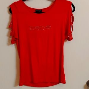 BEBE red sleeveless shirt. All offers welcomed!